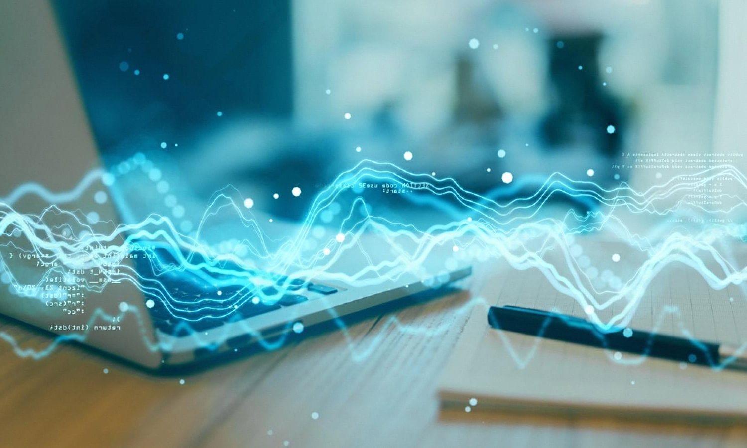 Laptop with cybersecurity data streams representing digital risk monitoring
